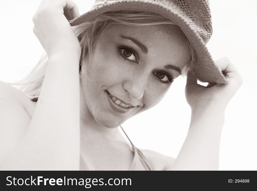 Photo of a model with a hat. Photo of a model with a hat.