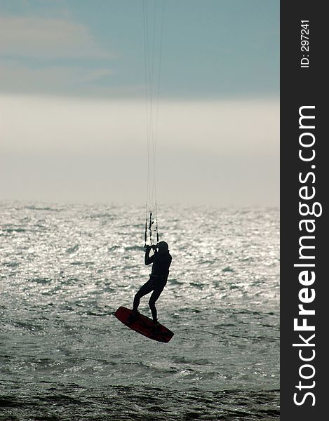 A parasurfer getting some air near Santa Cruz, California