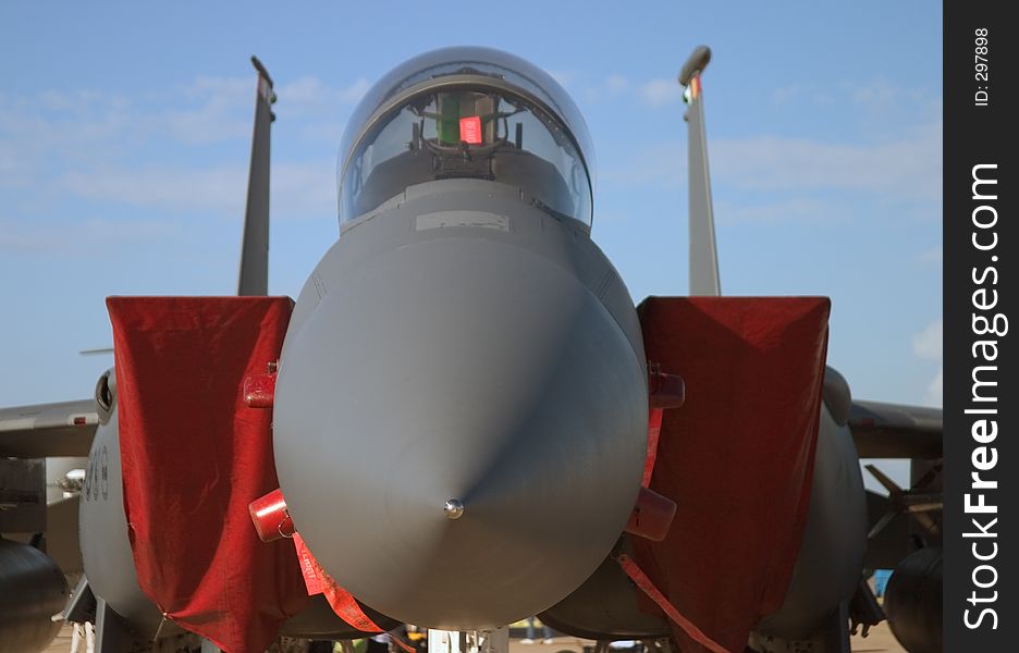 Extreme close-up of An American air-superiority fighter, viewed head-on with focus on the tip of the radome. Extreme close-up of An American air-superiority fighter, viewed head-on with focus on the tip of the radome.
