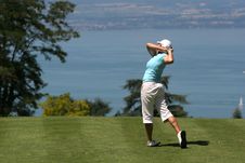 Lady Golf Swing At Leman Lake Stock Images