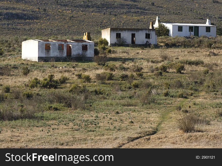Old farmhouses on a hill destroyed and deserted. Old farmhouses on a hill destroyed and deserted