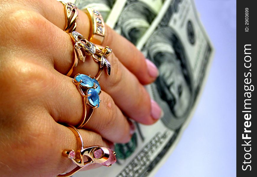 Rich woman, hand with dollars. Rich woman, hand with dollars