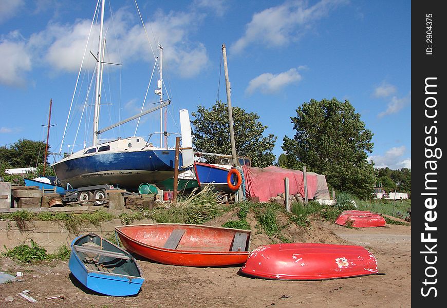 A boat yard were boats and yaghts are stored to be repaired