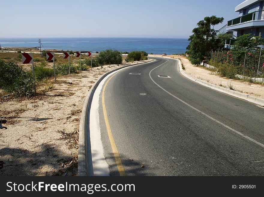 A photo of highway near the sea