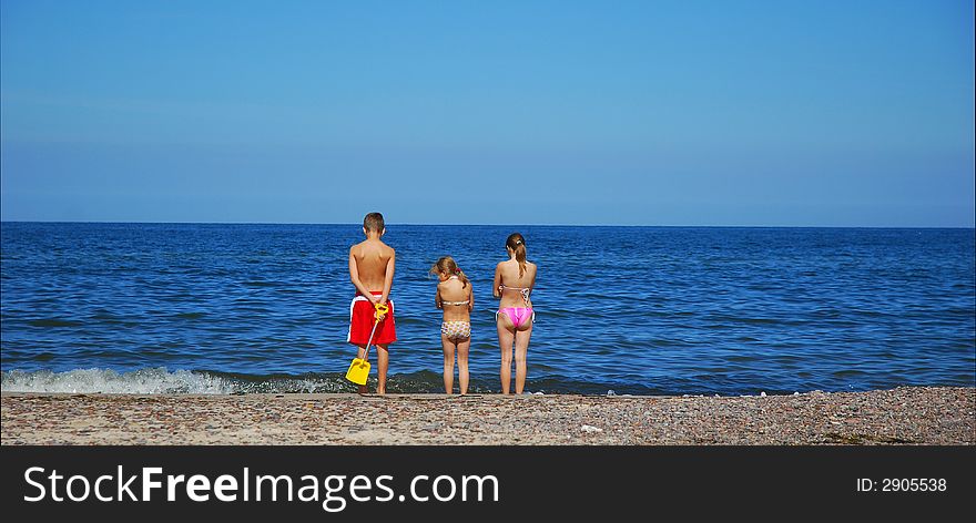 Three children at the beach. Three children at the beach