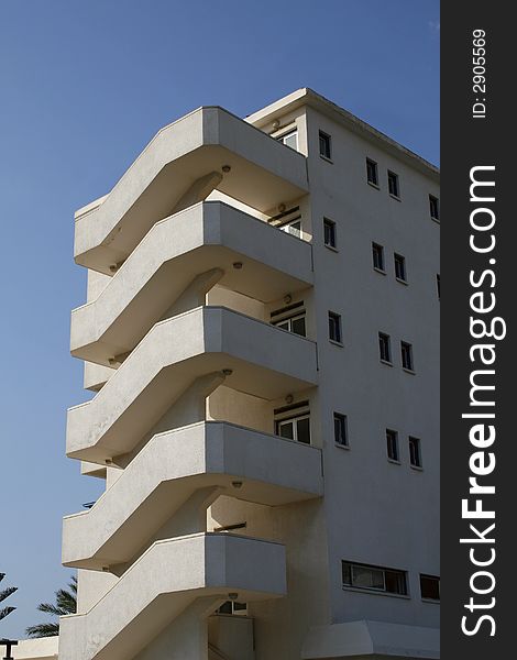 A photo of modern industrial building and sky. A photo of modern industrial building and sky