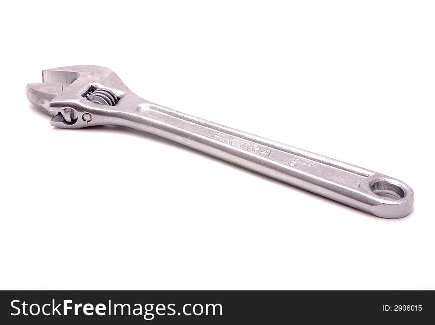 An adjustable spanner, isolated on white. An adjustable spanner, isolated on white