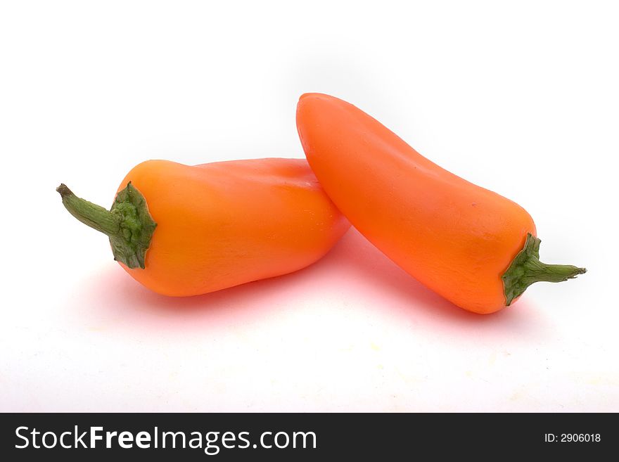 Orange sweet peppers, isolated on white. Orange sweet peppers, isolated on white