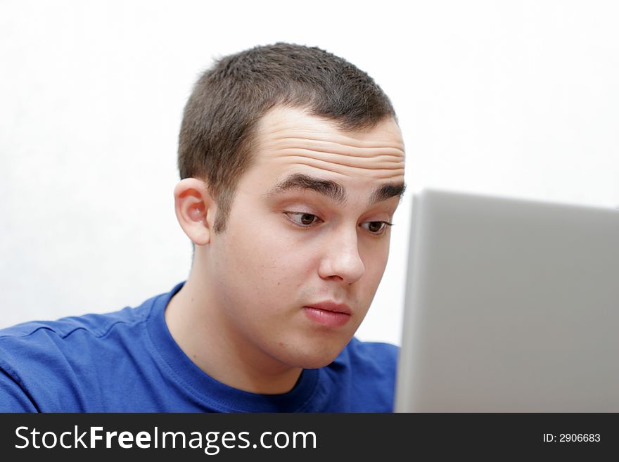 Student working on his laptop