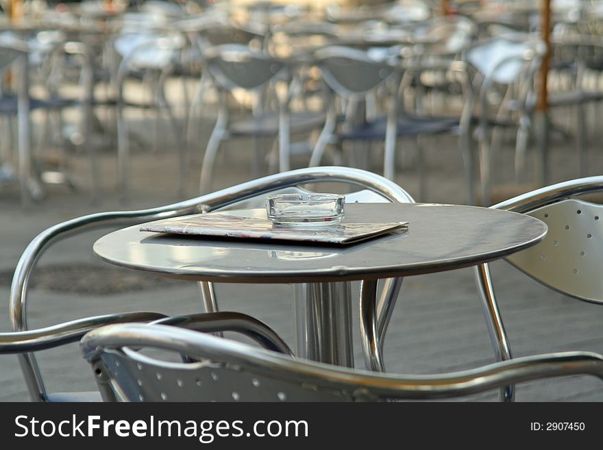 Empty desks in a bistro, outdoor, monochrome