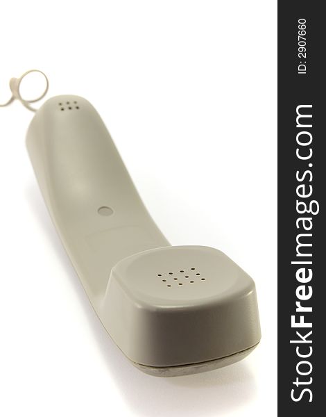 A modern phone handset, isolated on a white background. A modern phone handset, isolated on a white background.