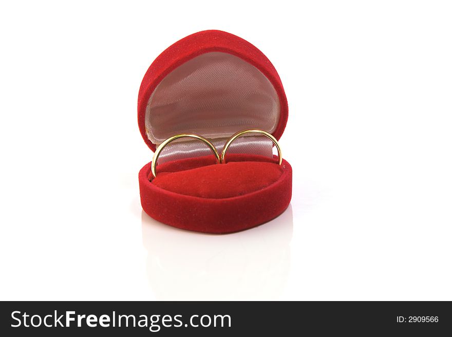 Gold wedding rings in red box