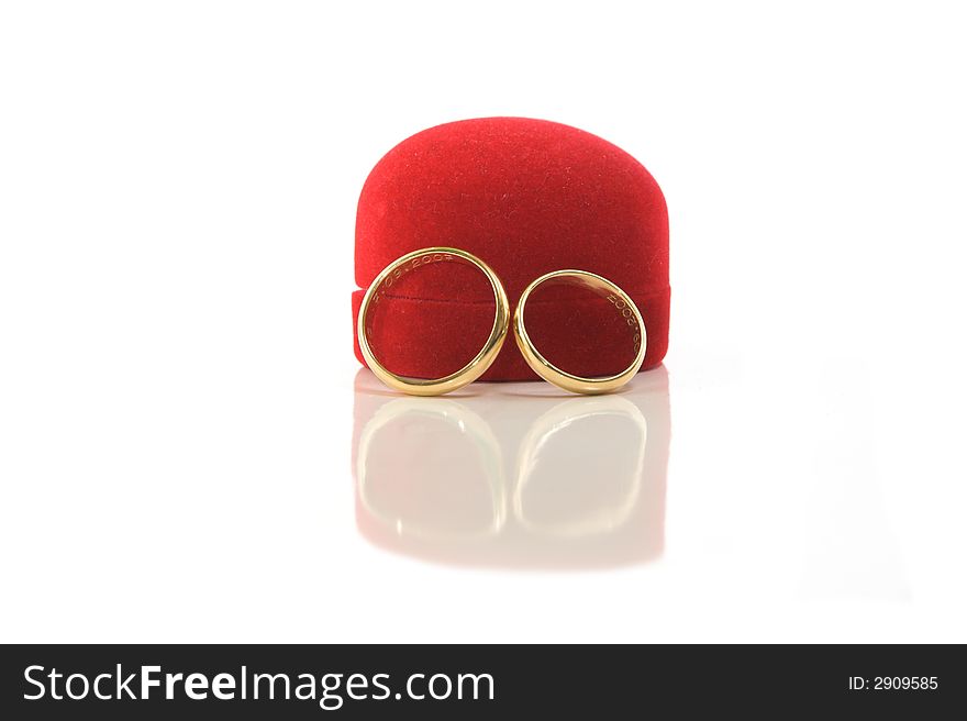 Gold wedding rings in red box