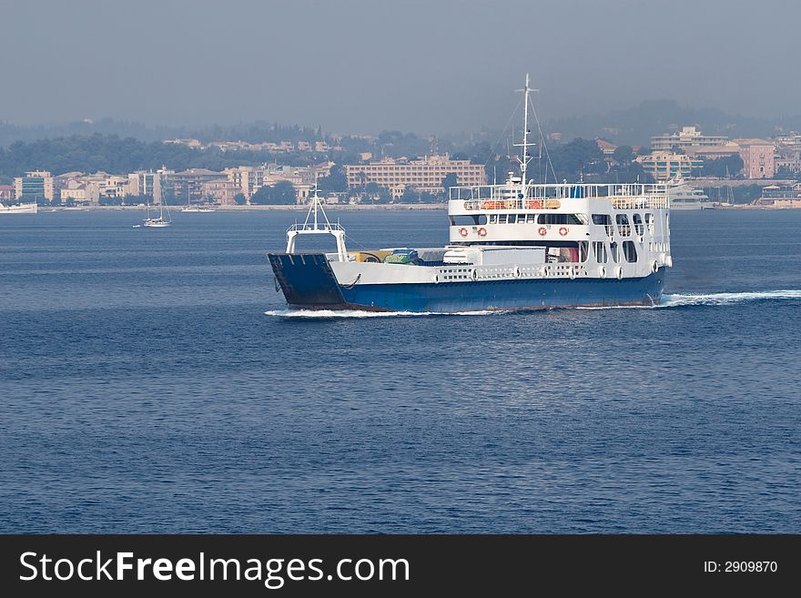 Blue ferry boat near Corfu island - Greece main port