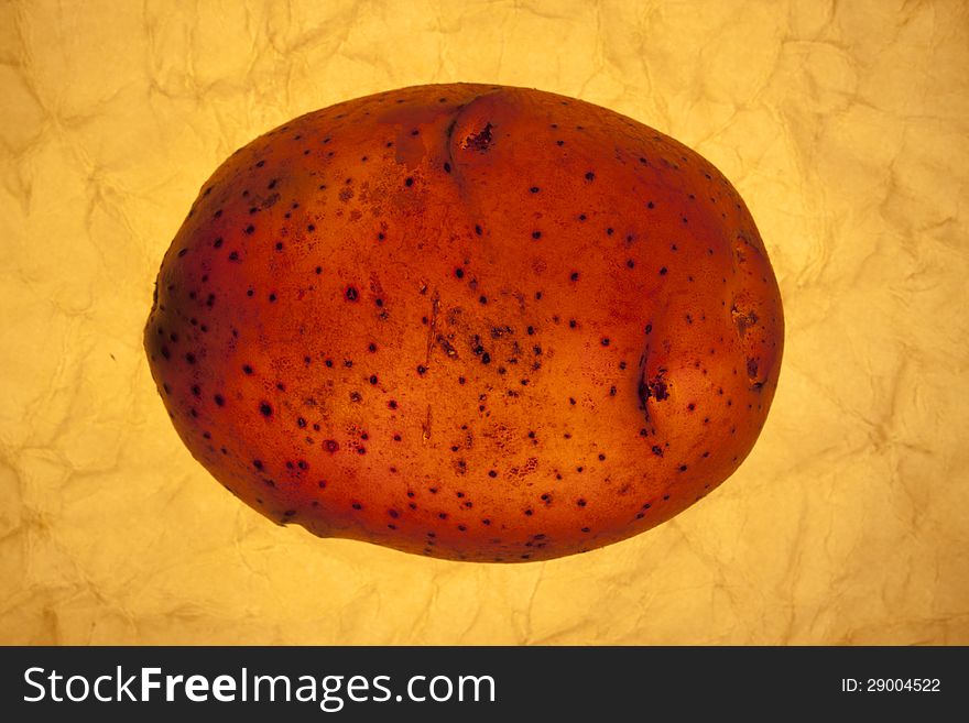 Potatoes on a yellow background