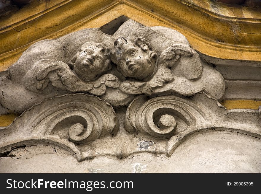 Statue of two children's heads. Statue of two children's heads