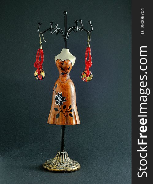 Wooden jewelry hanger shaped amber earrings woman