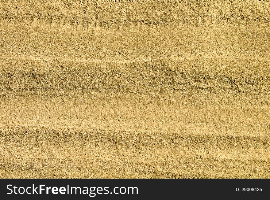 Texture of the sand with traces of water. Texture of the sand with traces of water