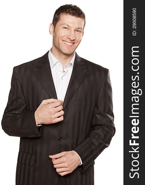 Portrait of a businessman smiling, on white background