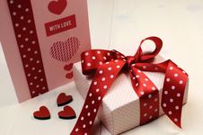 Love Theme Ft Card With Pink Gift And Red Polka Dot Ribbon And Hearts. Royalty Free Stock Image Love Theme Ft Card With Pink Gift And Red Polka Dot Ribbon And Hearts. Royalty Free Stock Image