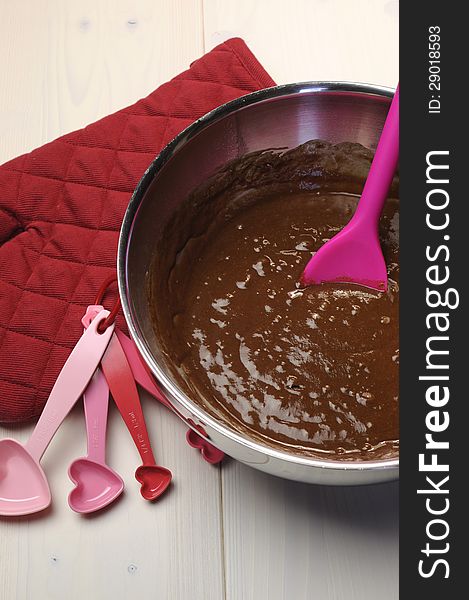 Love themed chocolate cake mix and baking accessories. Vertical.