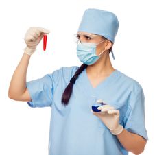 Woman Doctor With Red Flask In Their Hands Stock Photography Woman Doctor With Red Flask In Their Hands Stock Photography