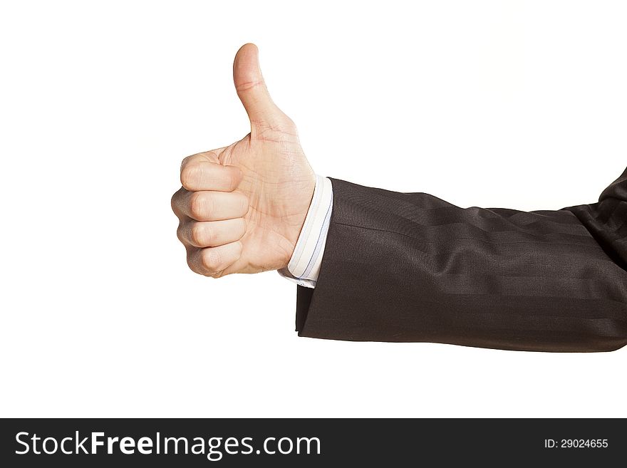 Strong male hand of businessman showing thumbs up on white background