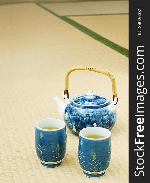 Green tea in a bowl on a tatami floor