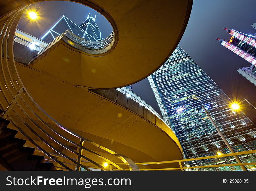 A view of the lights and skyscrapers in downtown Hong Kong at night