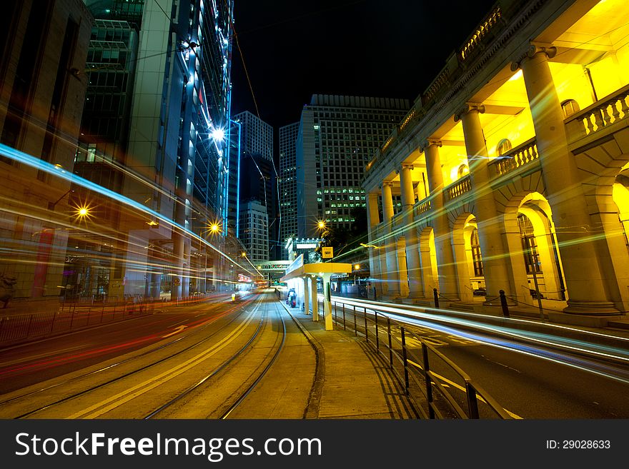 A view of the lights and skyscrapers in downtown Hong Kong at night