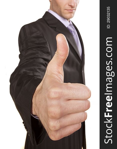 Close up of strong male hand of businessman showing thumbs up on white background