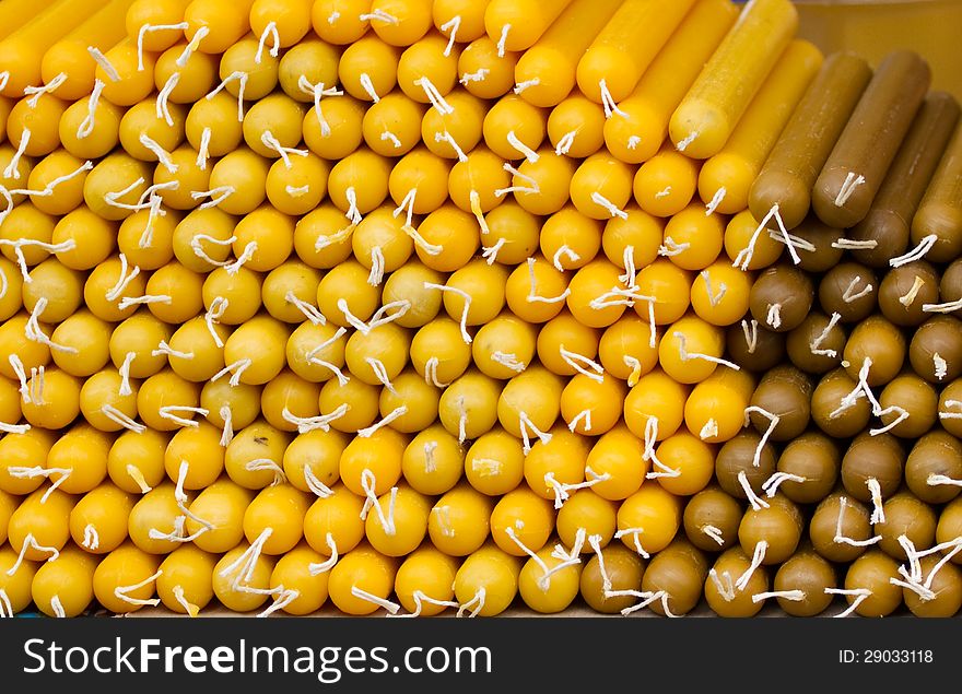 Yellow candles - a background. Yellow candles - a background.