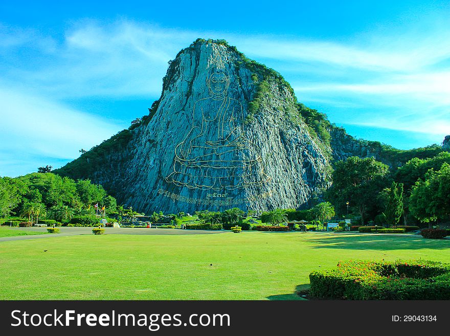 Carved buddha image cliff at Khao Chee Jan