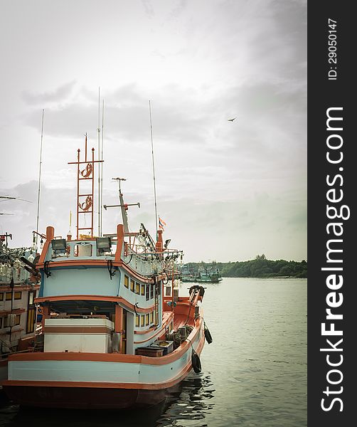 Fishing boat at the seaport in the evening