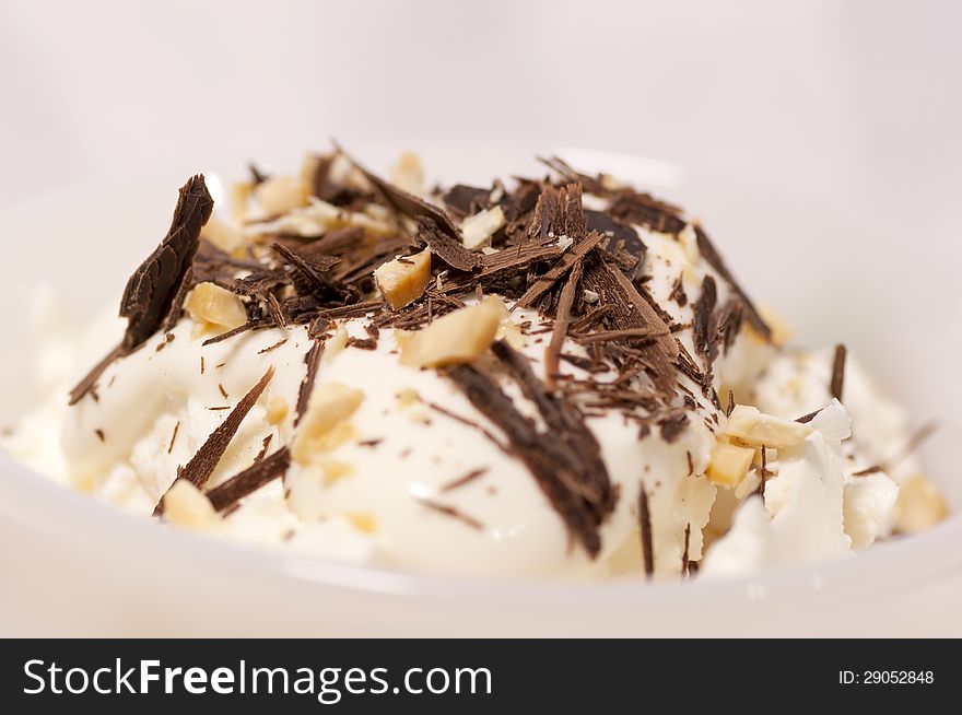 Dessert with cream, chocolate shaving and grated nuts. Dessert with cream, chocolate shaving and grated nuts