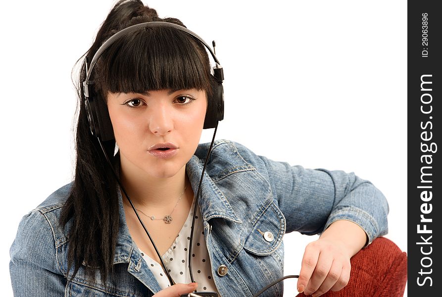 Beautiful young woman with headphones listen music, isolated on white background