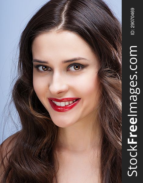 Portrait of brunette with red lips. Close up. Portrait of brunette with red lips. Close up