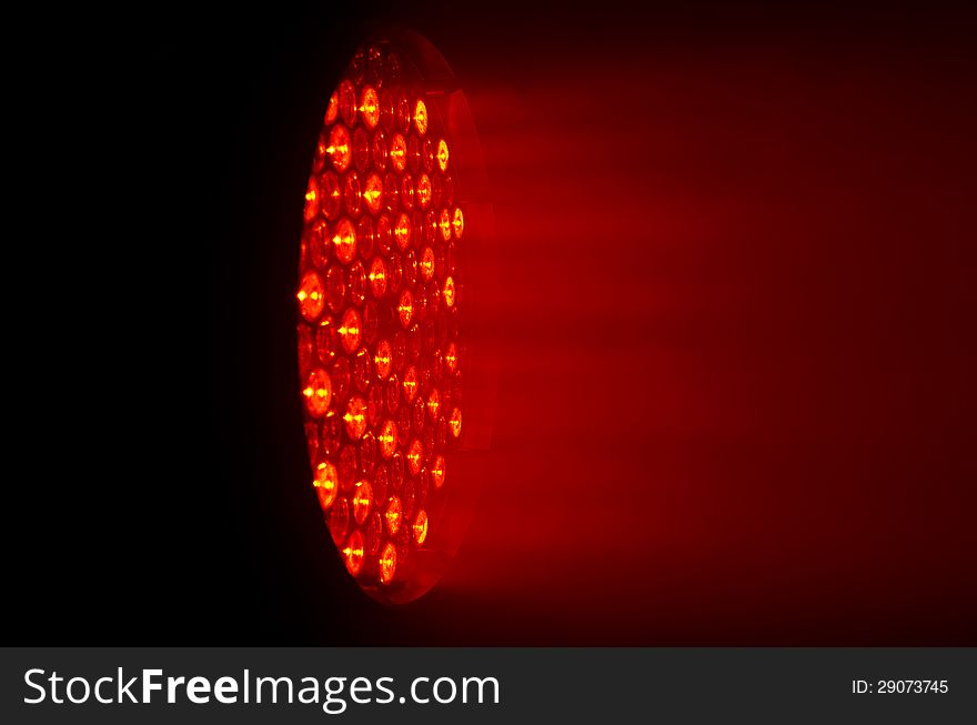 Close up of red disco lighting source