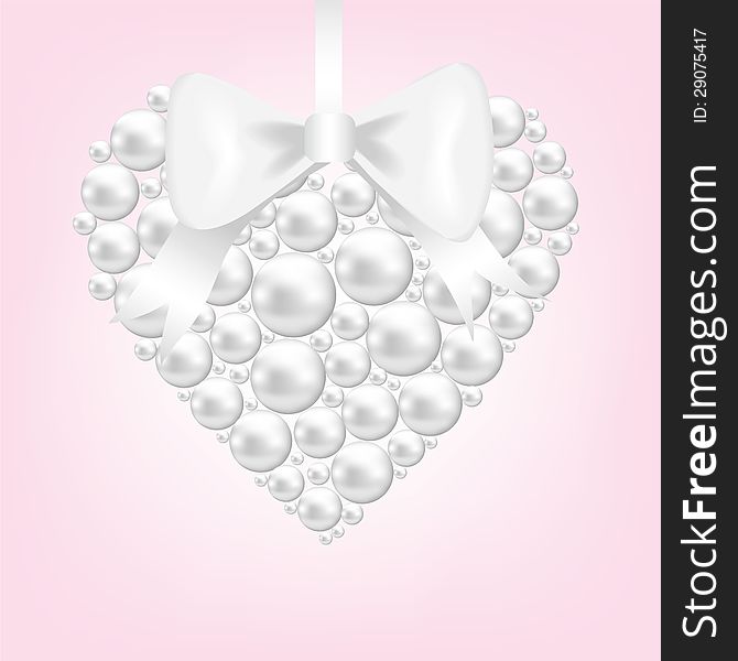 Pearl heart with bow on pink background