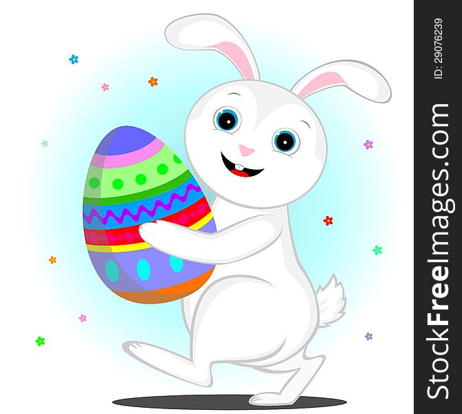 Cheerful white rabbit is painted Easter egg. Cheerful white rabbit is painted Easter egg