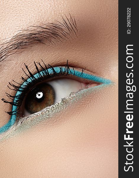 Cosmetics, macro eye make-up. Fashion mint liner eyeshadows