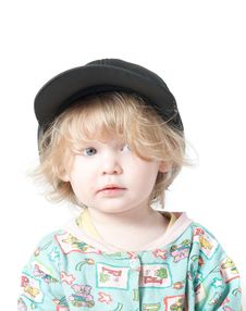A Child In A Cap. Royalty Free Stock Photo