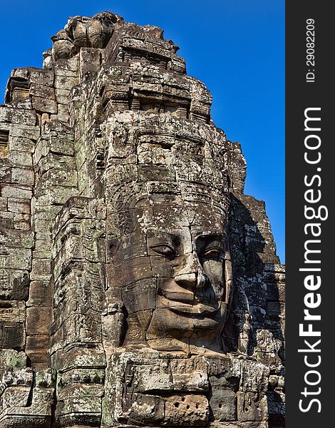 Smiling faces in the Temple of Angkor Wat. Smiling faces in the Temple of Angkor Wat