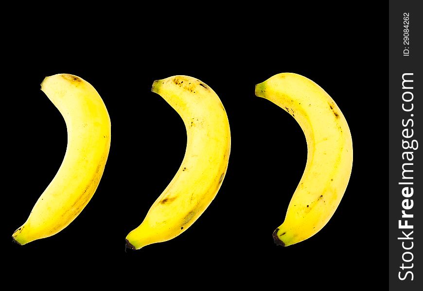 Ripe bananas  on black background