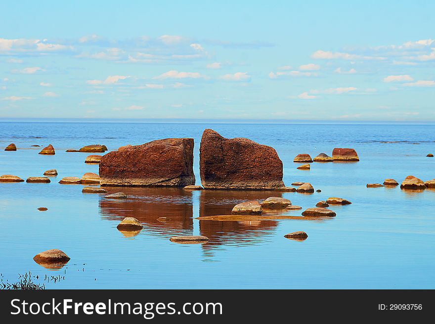 Large stones on the seaside in the spring