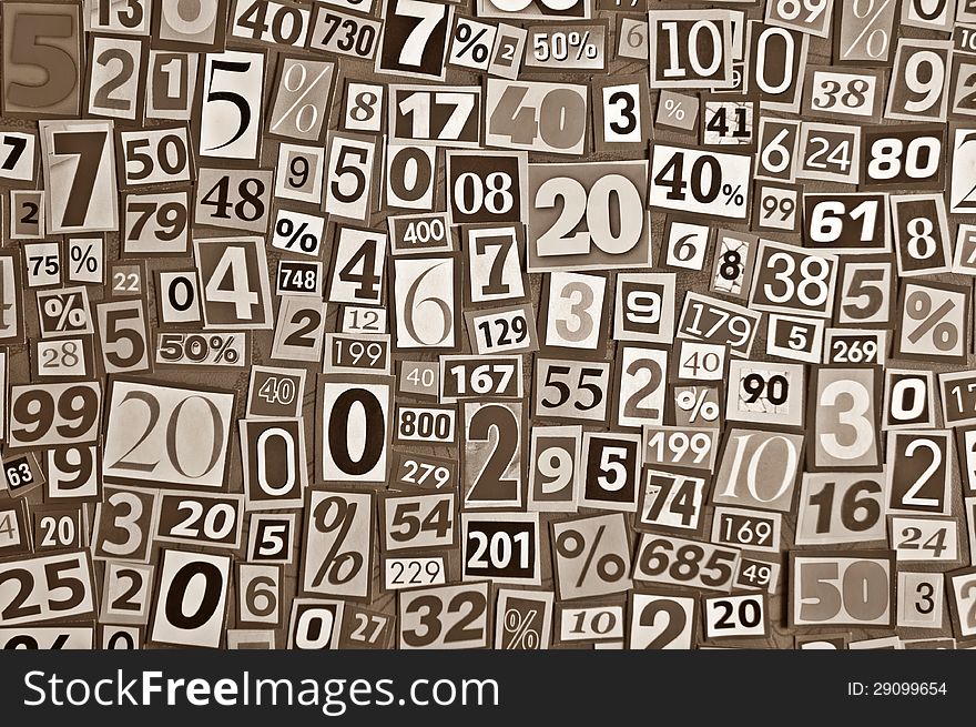 Background composed of numbers cut from newspapers. Background composed of numbers cut from newspapers