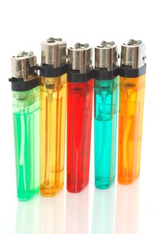 Coloured Lighters Stock Images