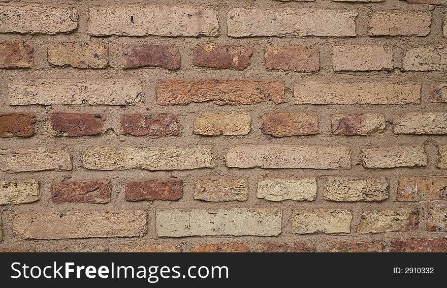 Old bricks fortification background red whit stone. Old bricks fortification background red whit stone