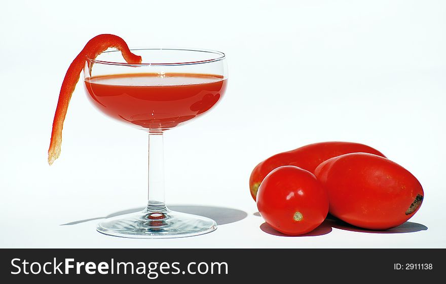Tomato Cocktail and tomatoes. Isolated. Bright colorful warm naturel light. Tomato Cocktail and tomatoes. Isolated. Bright colorful warm naturel light.