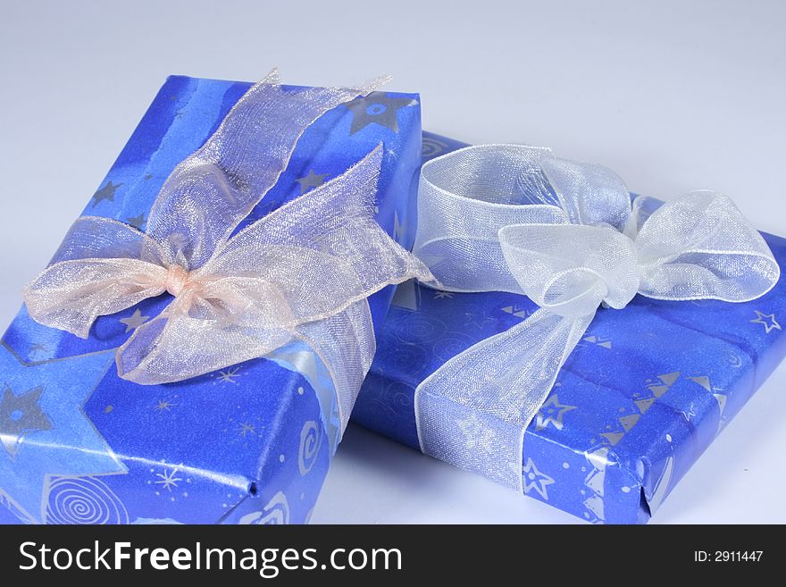 Blue gift wrapping with some ribbons. Blue gift wrapping with some ribbons